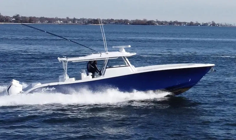 The Image of 2023 Yellowfin 42 Offshore boat cruising on open water. - 0