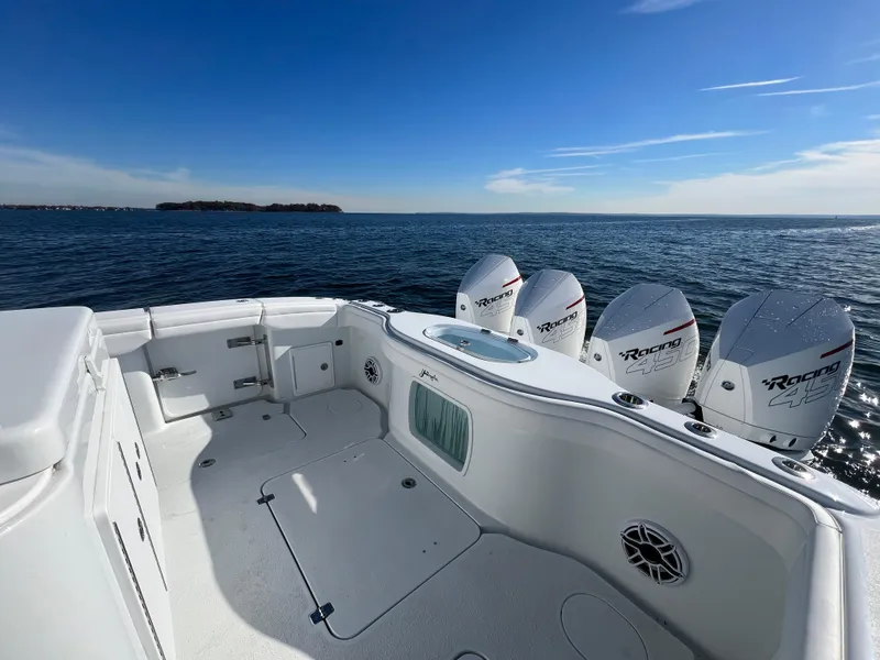 Slide: The Image of 2023 Yellowfin 42 Offshore boat with powerful engines on open water. - 9