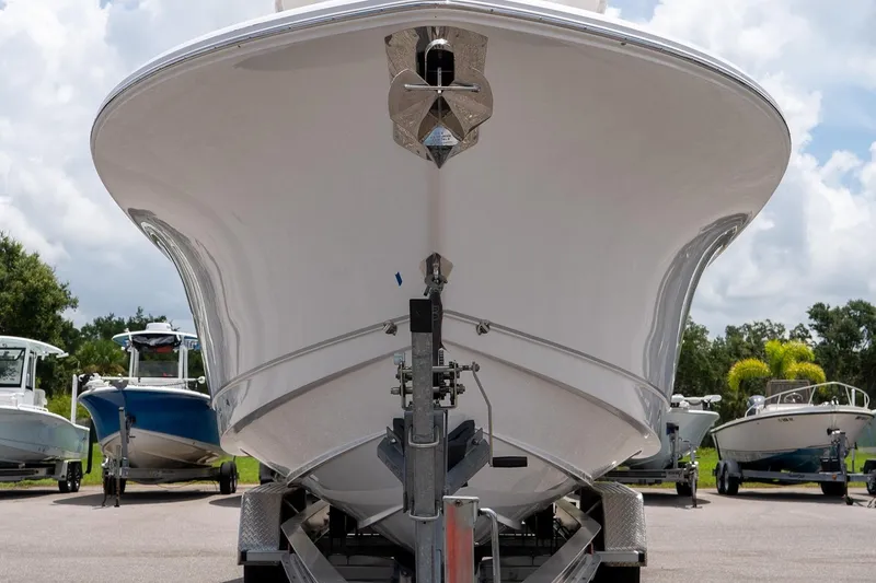 Slide: The Image of 2026 Sea Hunt Gamefish 27 Coffin Box boat on trailer, front view. - 11