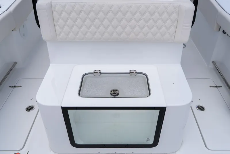 Slide: The Image of 2026 Sea Hunt Gamefish 27 Coffin Box with cushioned seating and storage compartment. - 25