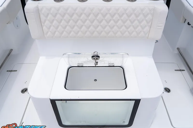 Slide: The Image of 2026 Sea Hunt Gamefish 27 Coffin Box with cushioned seating and storage compartment. - 26