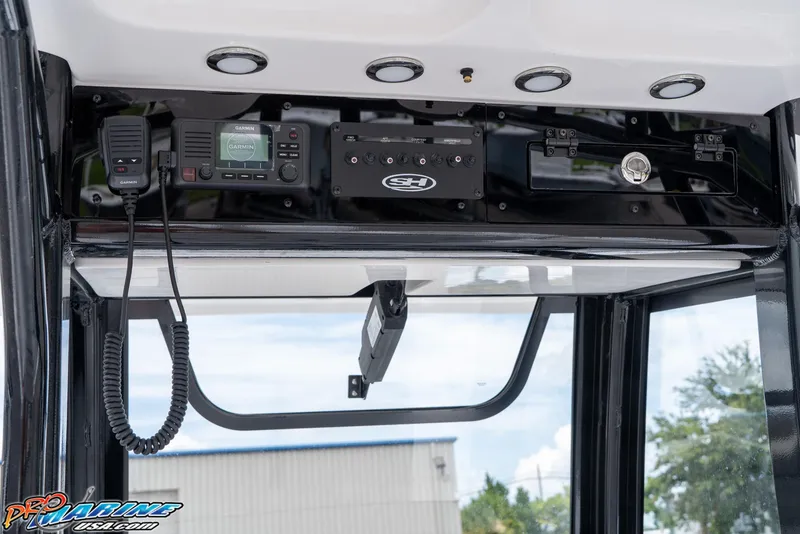 Slide: The Image of Control panel of 2026 Sea Hunt Gamefish 27 Coffin Box with Garmin electronics. - 30