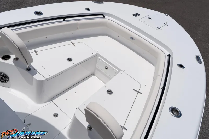 Slide: The Image of 2026 Sea Hunt Gamefish 27 Coffin Box boat interior with seating and storage compartments. - 34