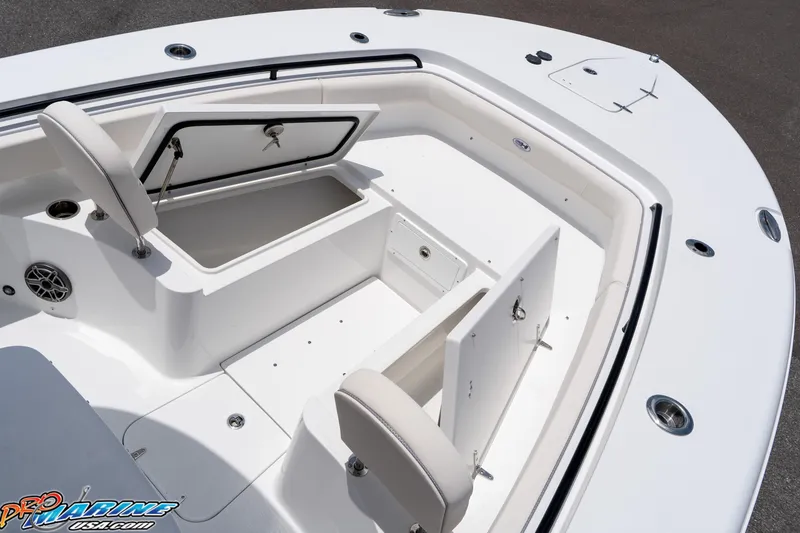 Slide: The Image of 2026 Sea Hunt Gamefish 27 Coffin Box boat interior with open storage compartments. - 35