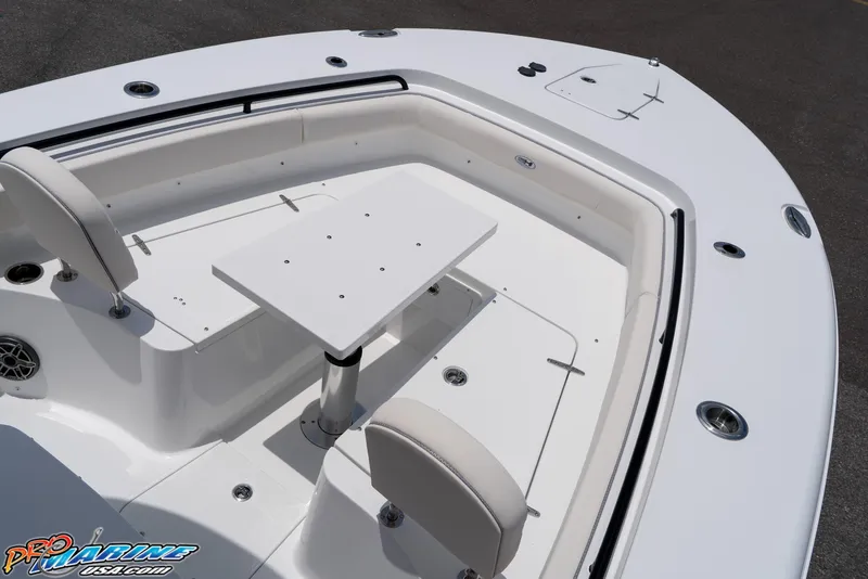 Slide: The Image of 2026 Sea Hunt Gamefish 27 Coffin Box boat interior with seating and table. - 37
