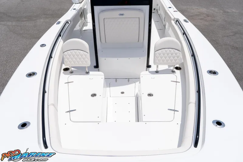 Slide: The Image of 2026 Sea Hunt Gamefish 27 Coffin Box boat interior with seating and storage compartments. - 39