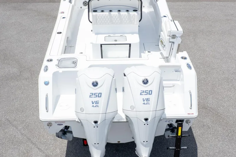 Slide: The Image of 2026 Sea Hunt Gamefish 27 Coffin Box with twin 250 V6 engines, aerial view. - 4