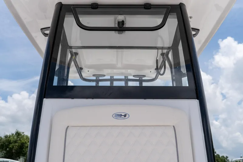 Slide: The Image of 2026 Sea Hunt Gamefish 27 Coffin Box boat console with clear windshield and logo. - 41