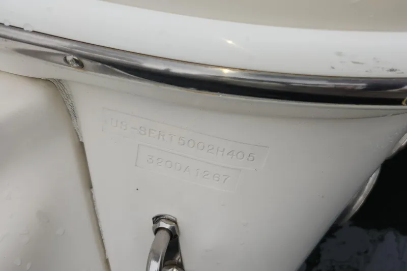 Slide: The Image of Close-up of 2005 Sea Ray 320 Sundancer hull identification number. - 13