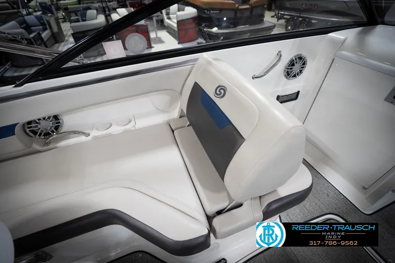 Slide: The Image of Interior of 2022 Hurricane 235RD boat with white seating and cup holders. - 24