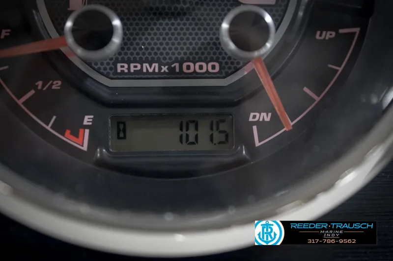 Slide: The Image of Close-up of a 2022 Hurricane 235RD tachometer displaying 1015 RPM. - 36