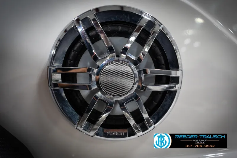 Slide: The Image of Chrome speaker grille on 2022 Hurricane 235RD boat, Reeder-Trausch Marine logo visible. - 43