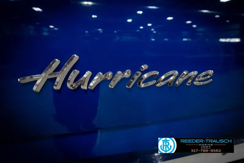 Slide: The Image of 2022 Hurricane 235RD logo on blue background, Reeder-Trausch Marine branding. - 52