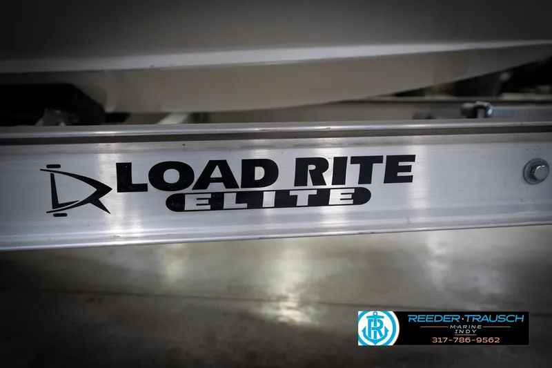 Slide: The Image of Load Rite Elite trailer for 2022 Hurricane 235RD boat at Reeder-Trausch Marine. - 56