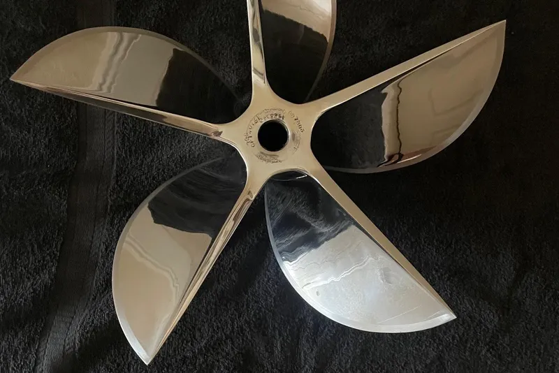 Slide: The Image of Shiny five-blade propeller for MTI 40RP 2007 model on black background. - 21