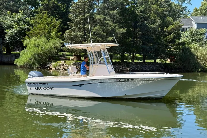 Slide: The Image of 2008 Grady-White Fisherman 222 boat named "Sea Goat" on a serene lake. - 4