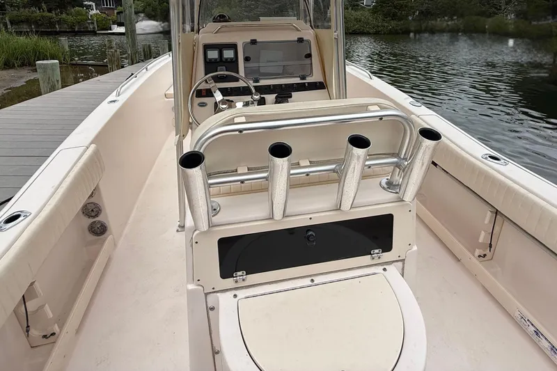 Slide: The Image of 2008 Grady-White Fisherman 222 boat interior with rod holders and steering console. - 7