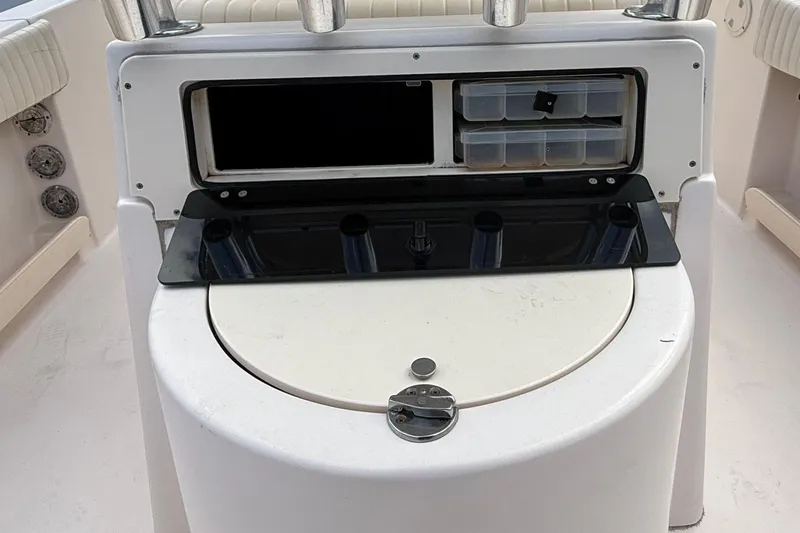 Slide: The Image of 2008 Grady-White Fisherman 222 boat console with storage compartments and rod holders. - 8