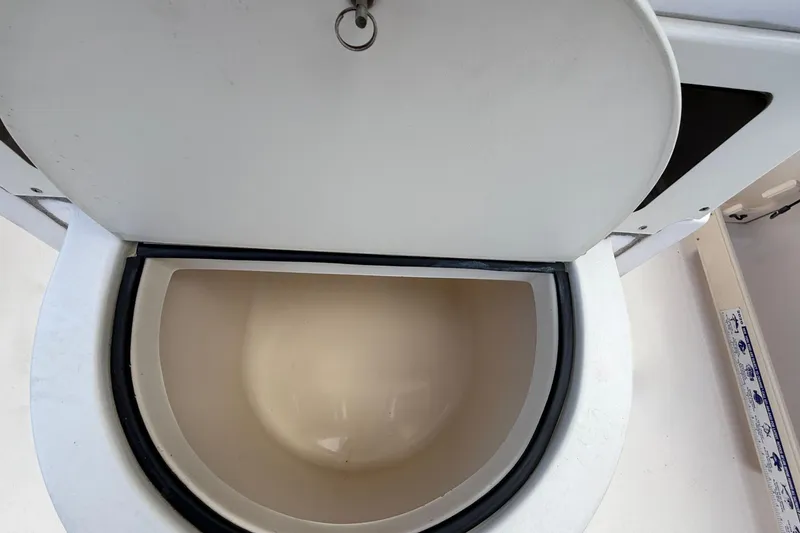 Slide: The Image of Open storage compartment on 2008 Grady-White Fisherman 222 boat. - 9