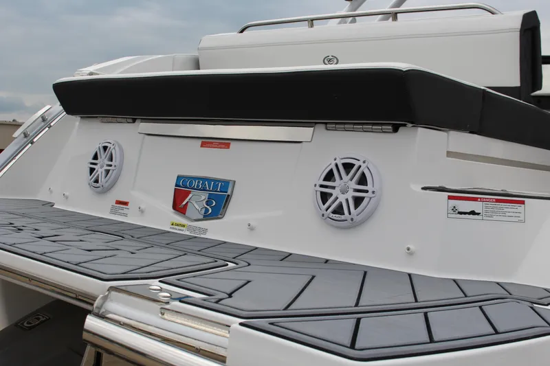 Slide: The Image of 2025 Cobalt R8 boat rear view with speakers and logo. - 10