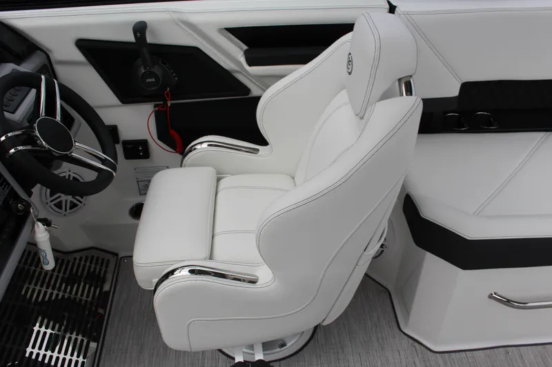 Slide: The Image of Luxurious white captain's chair in 2025 Cobalt R8 boat interior. - 23