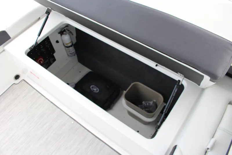 Slide: The Image of 2025 Cobalt R8 storage compartment with fire extinguisher and accessories. - 28