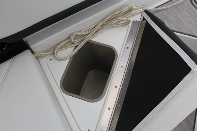 Slide: The Image of Cobalt R8 2025 boat storage compartment with rope, featuring sleek design and functionality. - 30