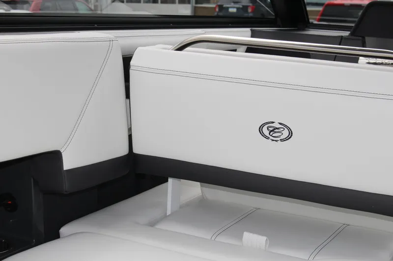 Slide: The Image of 2025 Cobalt R8 interior with white leather seats and embroidered logo. - 40