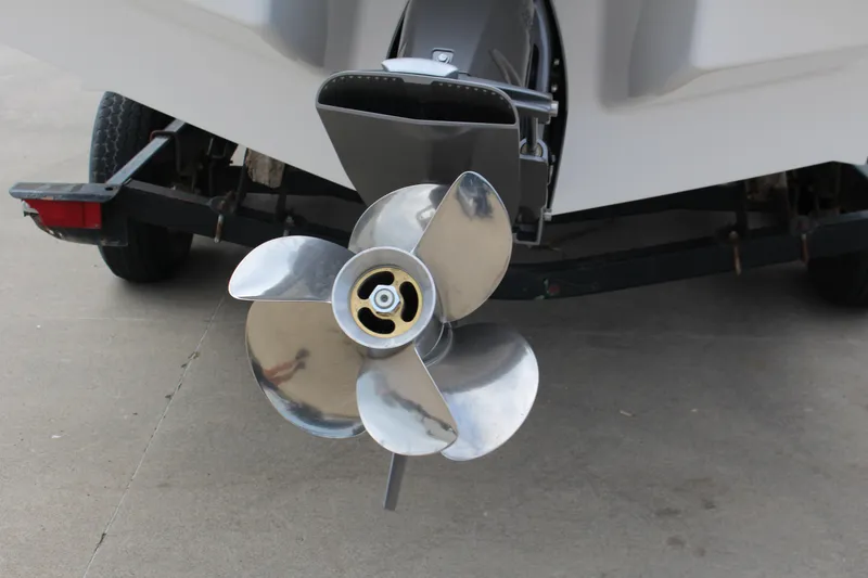 Slide: The Image of 2025 Cobalt R8 boat propeller on trailer, showcasing sleek design and metallic finish. - 8