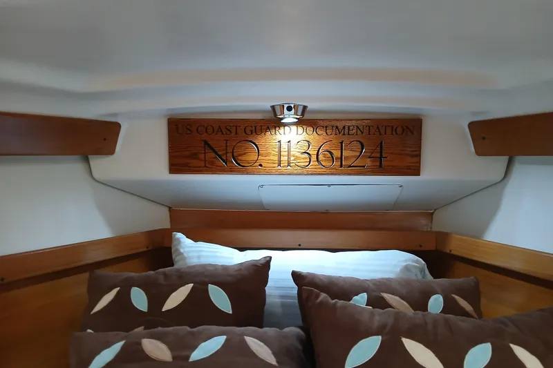 Slide: The Image of Interior of 2003 Catalina 350 sailboat with US Coast Guard documentation number. - 27