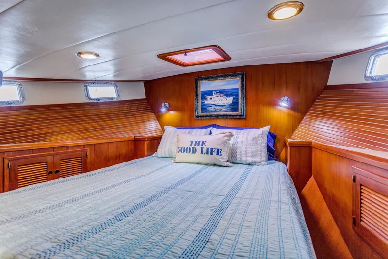 Slide: The Image of Cozy cabin interior of 2007 Kadey-Krogen Krogen 44' yacht with nautical decor. - 15