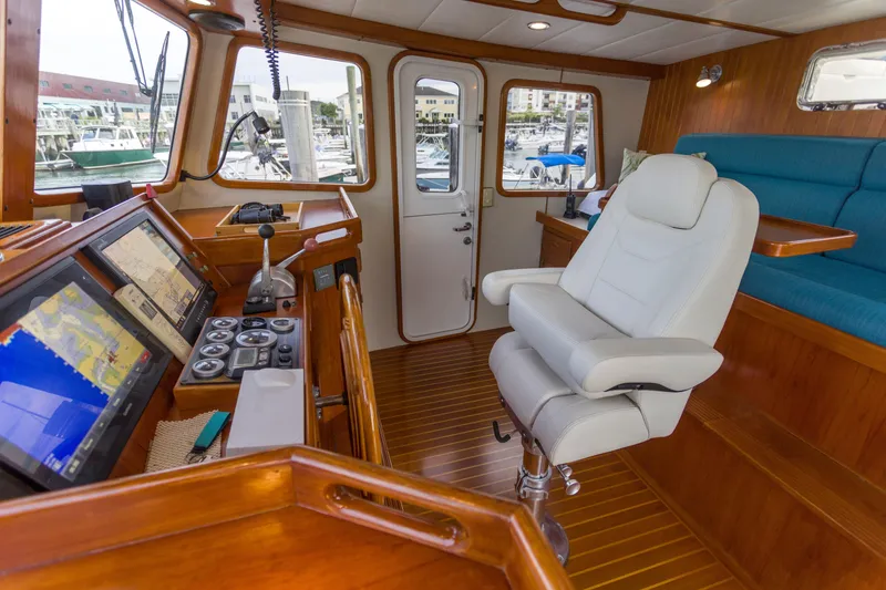 Slide: The Image of Interior of 2007 Krogen 44' Widebody yacht with navigation equipment and captain's chair. - 18