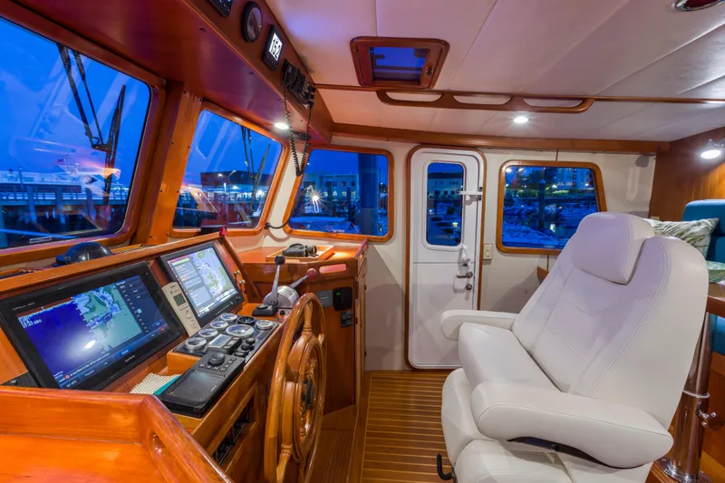 Slide: The Image of Pilothouse interior of 2007 Krogen 44' Widebody with navigation equipment and captain's chair. - 20