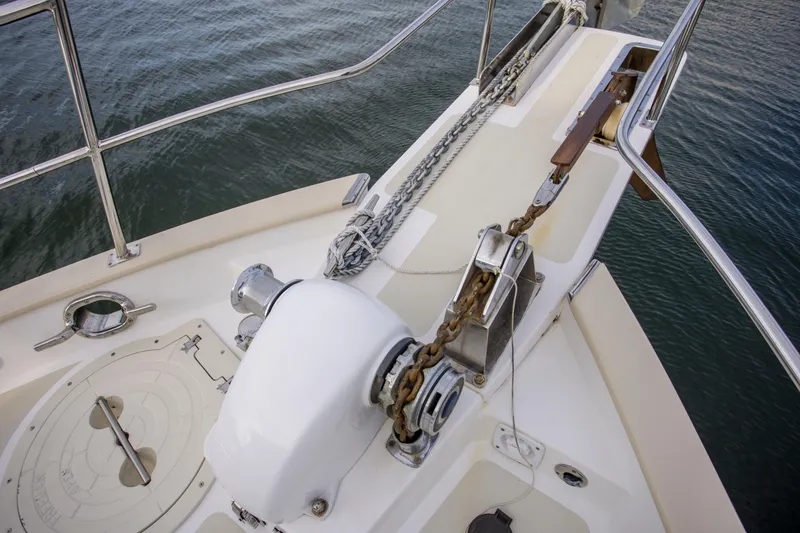 Slide: The Image of Bow of 2007 Krogen 44' Widebody yacht with anchor chain and winch system. - 32