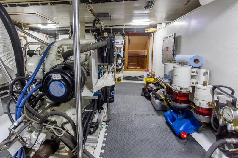 Slide: The Image of Engine room of 2007 Krogen 44' Widebody yacht, showcasing machinery and equipment. - 36