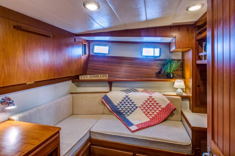 Slide: The Image of Cozy cabin interior of 2007 Krogen 44' Widebody yacht with quilted decor. - 8