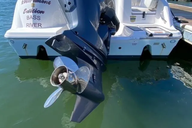 Slide: The Image of 2024 Sea Fox 228 Commander boat with outboard motor in water. - 23