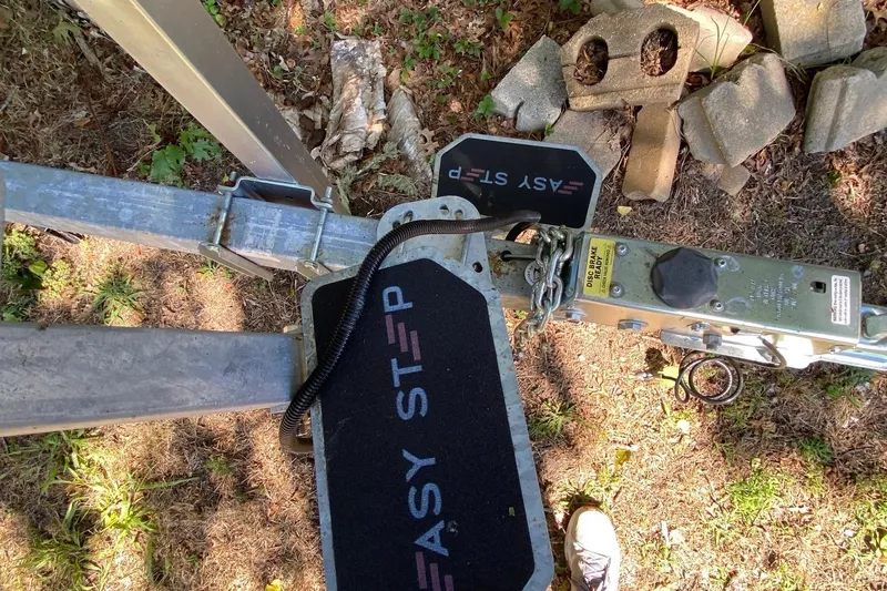 Slide: The Image of Trailer hitch with "Easy Step" feature for 2024 Sea Fox 228 Commander boat. - 26