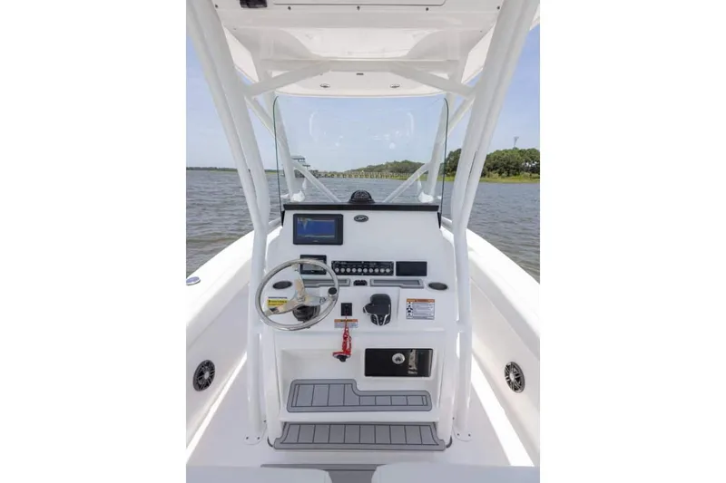 Slide: The Image of Manufacturer Provided Image: 2024 Sea Fox 228 Commander boat console with steering wheel and navigation controls. - 31