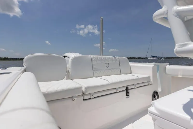 Slide: The Image of Manufacturer Provided Image: 2024 Sea Fox 228 Commander boat interior with white cushioned seating. - 36