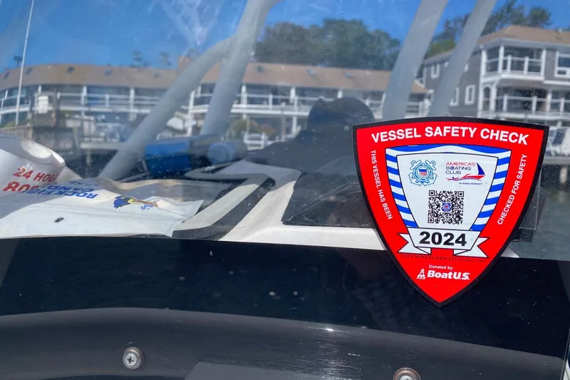 Slide: The Image of 2024 Sea Fox 228 Commander with vessel safety check sticker on windshield. - 21