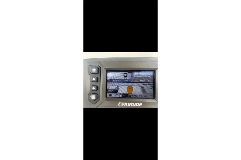 Slide: The Image of Evinrude boat control panel display on 2016 Ranger 2510 Bay Ranger. - 18