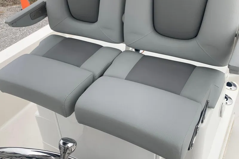 Slide: The Image of Gray seating on 2016 Ranger 2510 Bay Ranger boat, featuring cushioned design. - 5