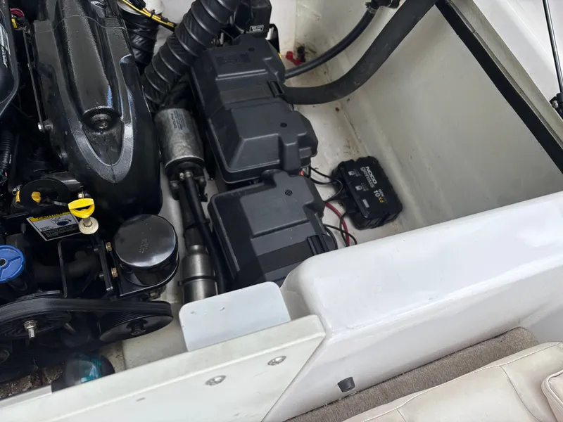 Slide: The Image of Engine compartment of a 2013 Glastron 205 MXSF boat. - 14