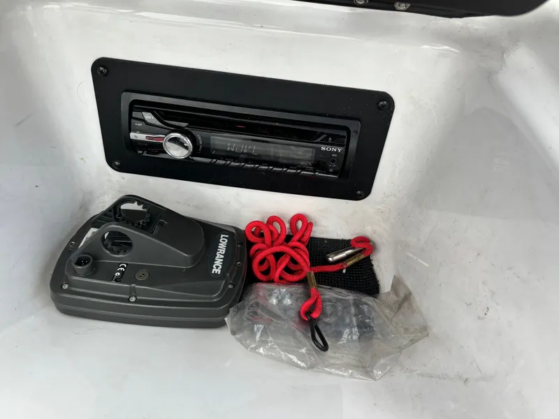 Slide: The Image of Glastron 205 MXSF 2013 boat equipment with Sony radio and Lowrance device. - 5