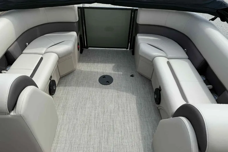 Slide: The Image of 2026 Bentley Pontoons Legacy 223 Navigator interior with plush seating and modern design. - 21