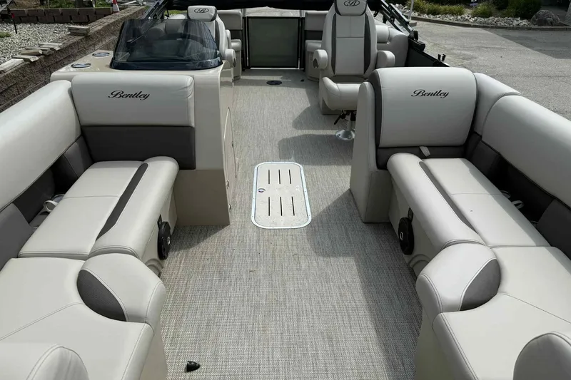 Slide: The Image of 2026 Bentley Pontoons Legacy 223 Navigator interior with luxurious seating and modern design. - 7