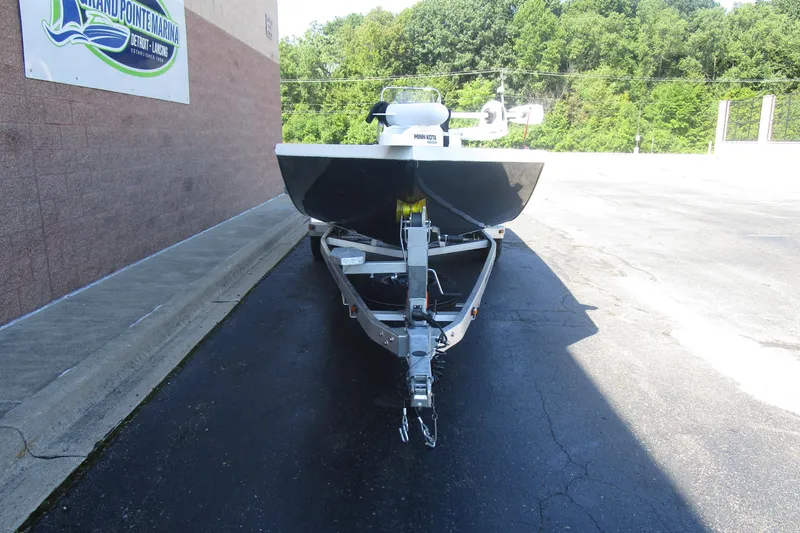 Slide: The Image of 2025 Ranger RB210 boat on trailer at marina, front view. - 16