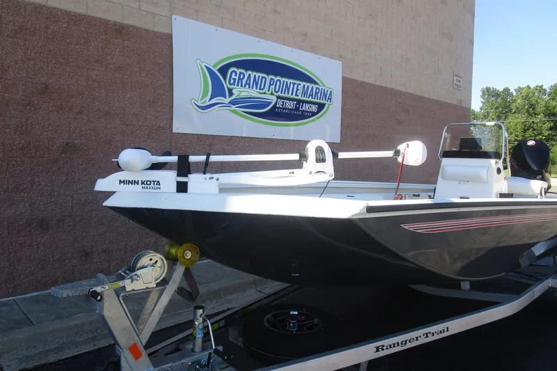 Slide: The Image of 2025 Ranger RB210 boat at Grand Pointe Marina, featuring Minn Kota Maxxum trolling motor. - 3