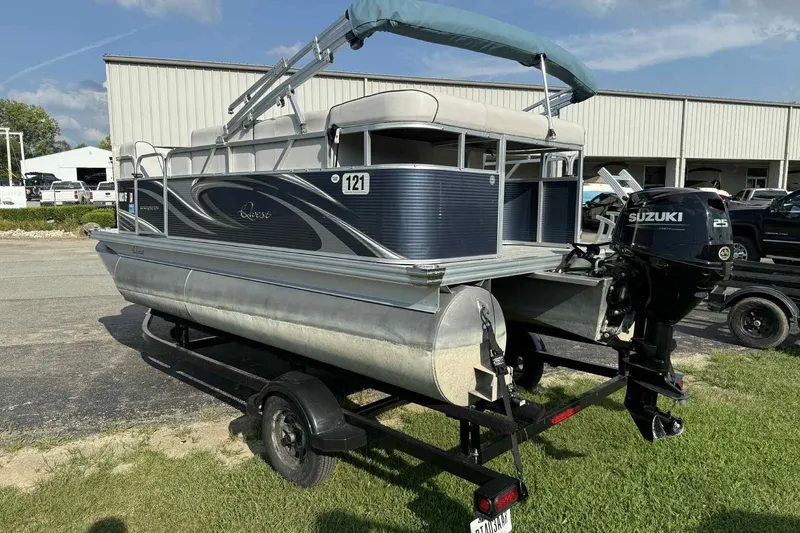 Slide: The Image of 2019 Qwest 816 Luxury Series pontoon boat with Suzuki 25 outboard motor on trailer. - 4